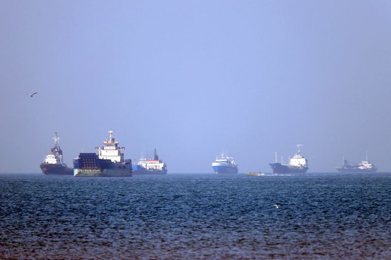 TOPSHOT - In this picture obtained from Iran's ISNA news agency on May 4, 2026, vessels are pictured anchored in the Strait of Hormuz off Bandar Abbas in southern Iran.