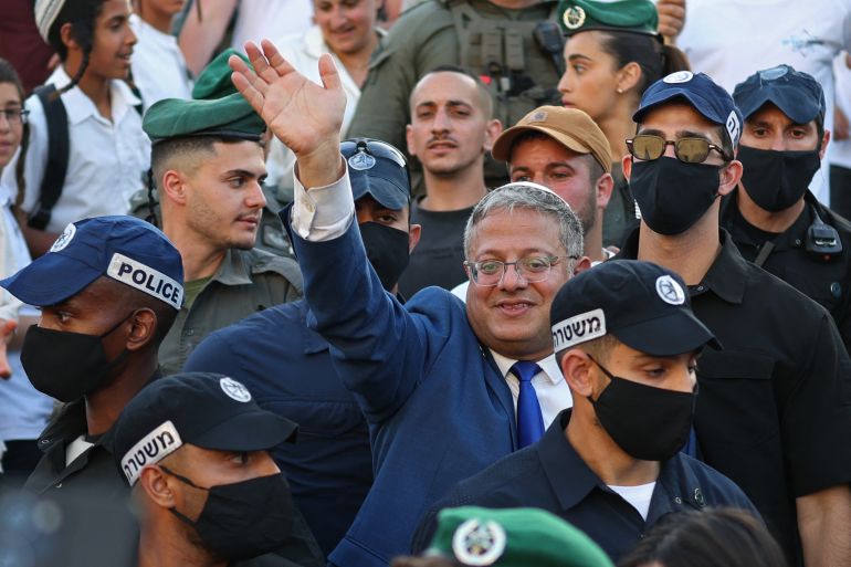 Israel's National Security Minister Itamar Ben Gvir (C) takes part in the Jerusalem Day parade at the Damascus Gate in the old city of Jerusalem on May 14, 2026.