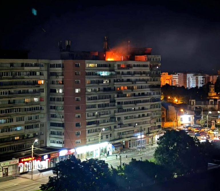 This handout photo provided by the Romanian Department for Emergency Situations (DSU) and taken early on May 29, 2026 shows flames rising from a residential building after a drone crash in the Romanian city of Galati, near the border with Ukraine.