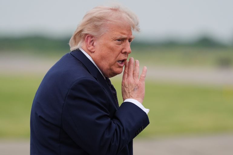 President Donald Trump walks from Marine One to board Air Force One at Morristown Airport, Friday, May 22, 2026, in Morristown, N.J. (AP Photo/Alex Brandon)