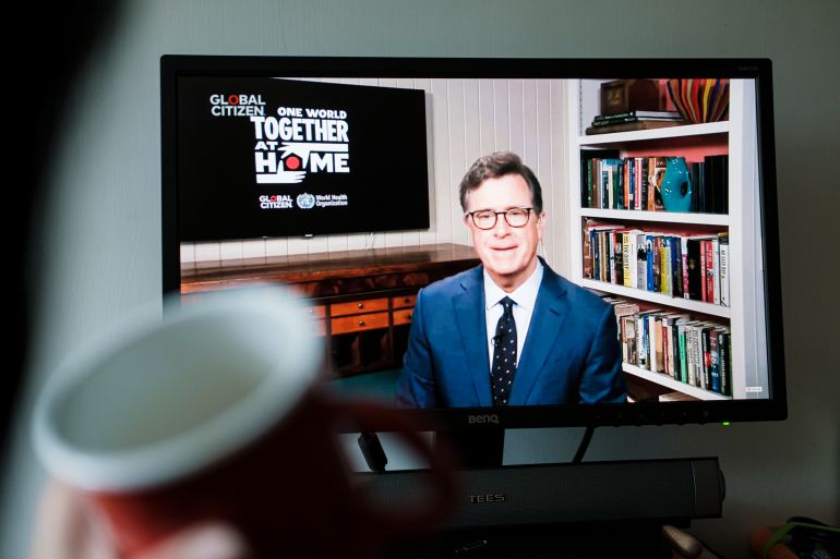 HONG KONG, CHINA - APRIL 19: American Comedian Stephen Colbert is seen on the computer screen as One World Together At Home is streaming live via the internet on April 19, 2020 in Hong Kong, China. One World Together At Home is a campaign rallying funds for the COVID-19 Solidarity Response Fund for the World Health Organization. The WHO's mission for COVID-19 is to prevent, detect, and respond to the pandemic. (Photo by Keith Tsuji/Getty Images)