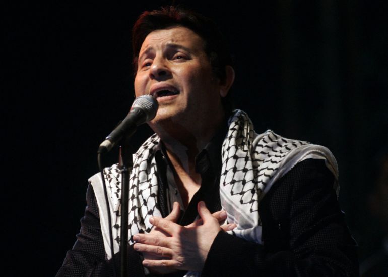 Egyptian singer Hani Shaker gives a concert at the International Stadium in the West Bank city of Jericho on December 11, 2008. Thousands of Palestinians turned out to watch Shaker give a concert on the last day of the Muslim feast of Eid al-Adha. AFP PHOTO/ABBAS MOMANI (Photo by ABBAS MOMANI / AFP)