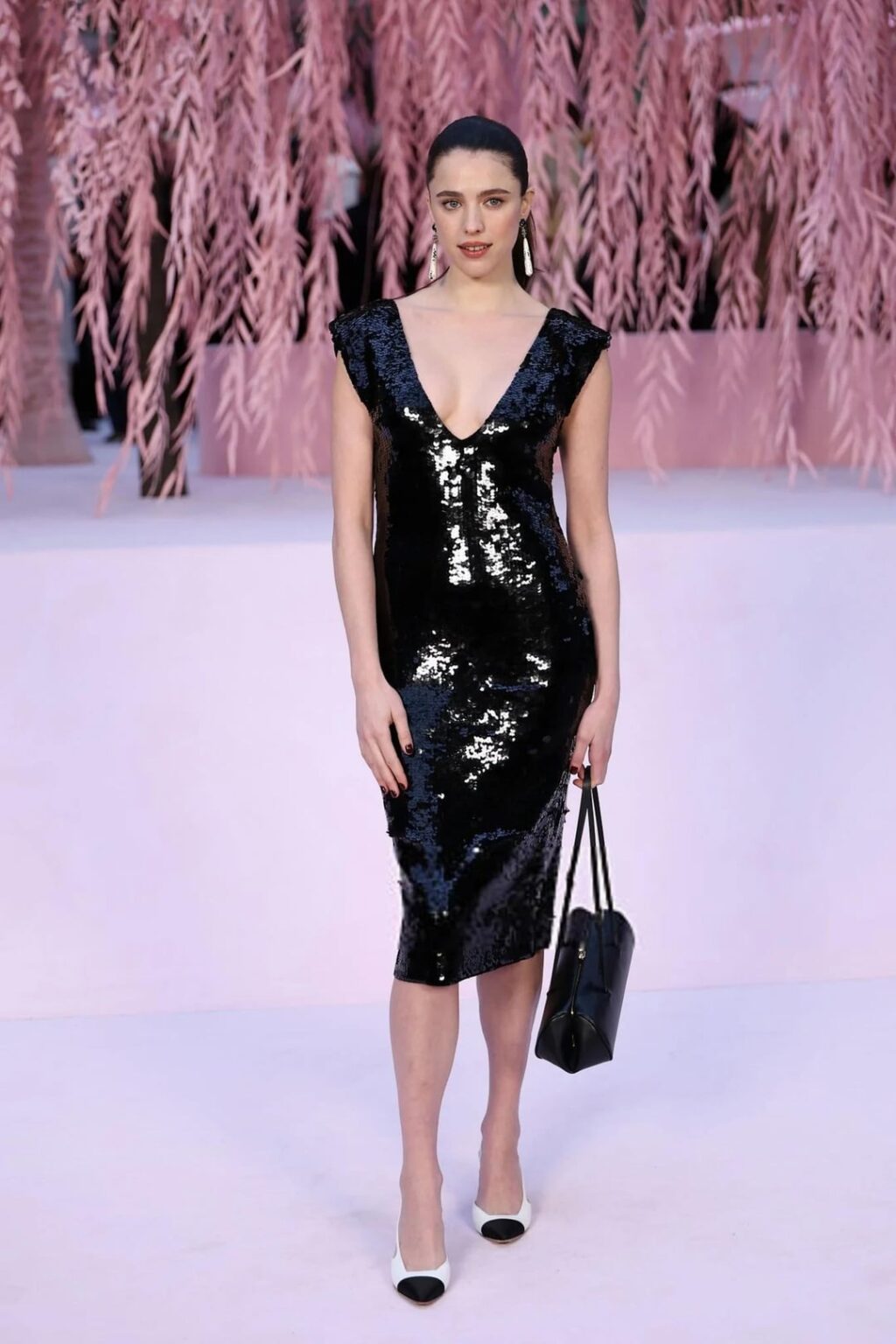 Margaret Qualley in sleek black, looking gorgeous