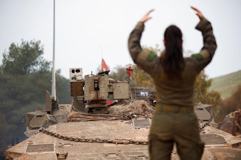 An armoured Israeli military vehicle operates inside Israel, near the Israel-Lebanon border, April 15, 2026. REUTERS/Florion Goga
