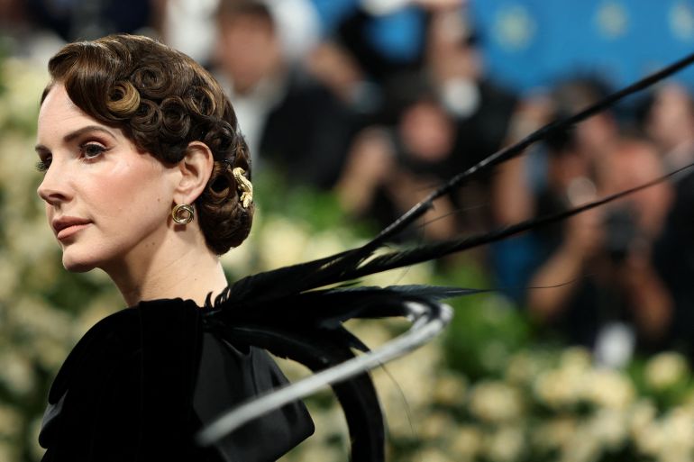 Lana Del Rey poses during the Met Gala, an annual fundraising gala held for the benefit of the Metropolitan Museum of Art's Costume Institute with this year's theme 'Superfine: Tailoring Black Style,' in New York City, New York, U.S., May 5, 2025. REUTERS/Mario Anzuoni