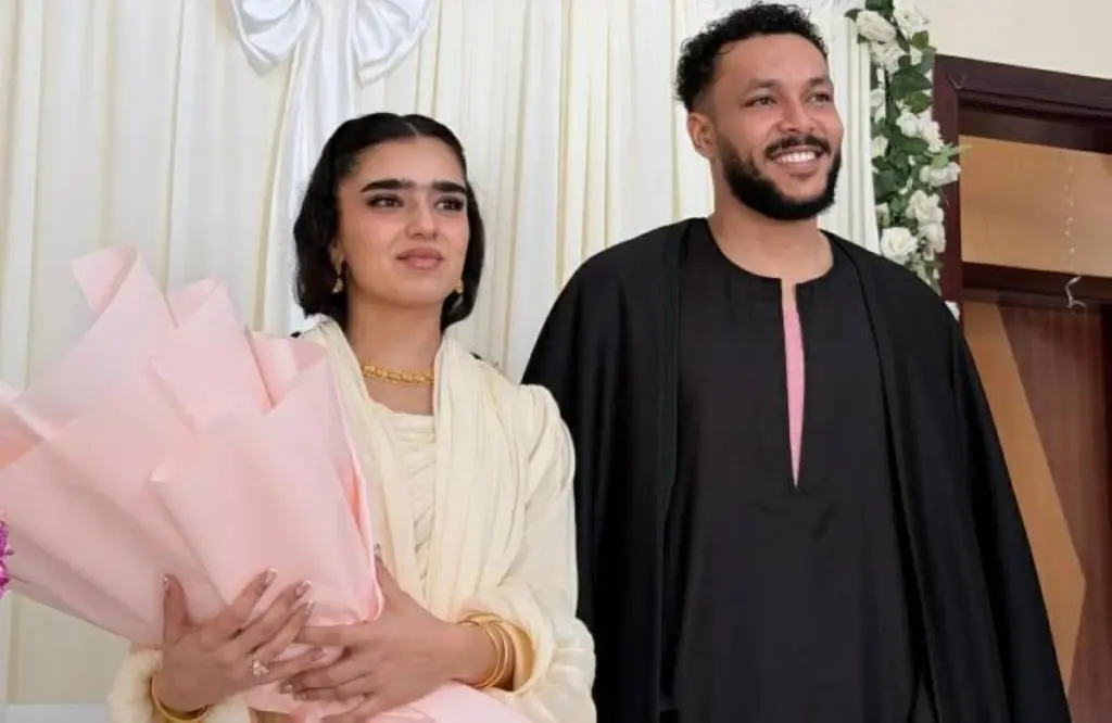 بعد تعرضها للتنمر.. زوجة ويجز تتوعد المسيئين بإجراءات قانونية: «بعد كده مش هسكت» ويجز وزوجته نور العزاوى - صورة أرشيفية