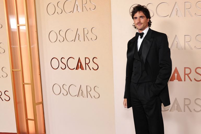 Jacob Elordi poses on the red carpet during the Oscars arrivals at the 98th Academy Awards in Hollywood, Los Angeles, California, U.S., March 15, 2026. REUTERS/Daniel Cole