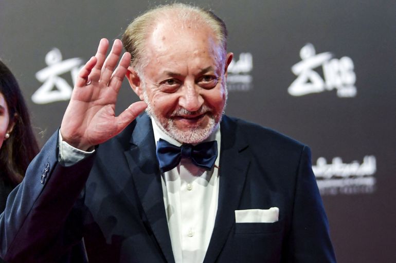 Egyptian actor Abdelaziz Makhyoun arrives to the opening ceremony of the 31st edition of the Carthage Film Days (JCC) film festival at the Opera House in Tunisia's capital Tunis on December 18, 2020. (Photo by FETHI BELAID / AFP)