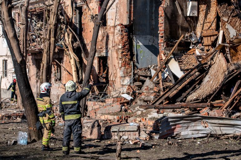 Ukrainian rescuers work by a damaged building following an air attack in Dnipro on June 2, 2026, amid the Russian invasion of Ukraine.