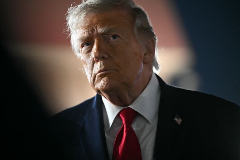 CORRECTION / US President Donald Trump speaks to the press before boarding Air Force One prior to departure from John F. Kennedy International Airport, in New York, on June 9, 2026.