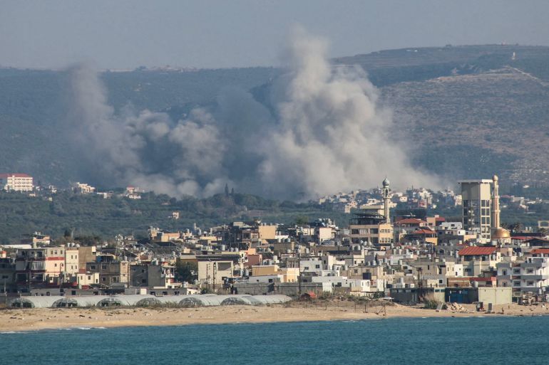 A photograph taken from the southern area of Tyre shows smoke rising from the sites of Israeli airstrikes on the village of Al-Qlaileh on June 10, 2026.