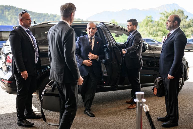 Pakistan's Prime Minister Muhammad Shehbaz Sharif (C) arrives at the Burgenstock luxury hotel complex overlooking Lake Lucerne, Switzerland, on June 21, 2026, ahead of high-level talks aimed at advancing a deal to end the Middle East conflict.