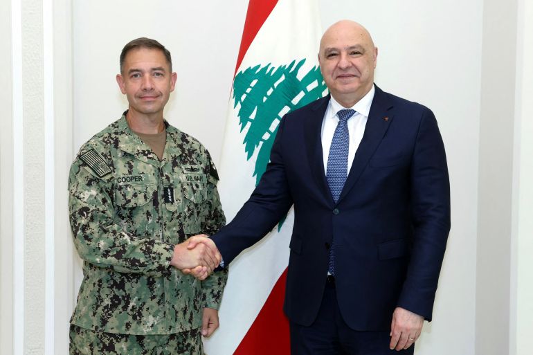 This handout photograph released by the Lebanese Presidency press office shows Lebanon's President Joseph Aoun (R) shaking hands with Admiral Brad Cooper, the commander of US Central Command (CENTCOM), during a meeting at the presidential palace in Baabda on June 29, 2026.