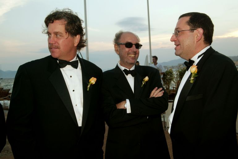 CANNES, FRANCE - MAY 19: (L-R) Sony Picture Classics co-President Tom Bernard , director Hector Babenco and Sony Picture Classics co-President Michael Barker mingle at the Sony Picture Classics dinner party for the film "Carandiru" at Martinez beach during 56th International Cannes Film Festival 2003 on May 19, 2003 in Cannes, France. (Photo by Evan Agostini/Getty Images)