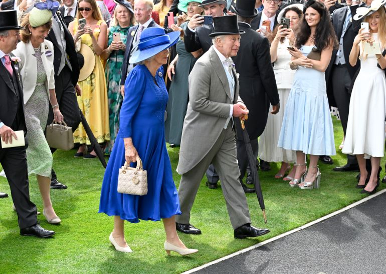 ASCOT, ENGLAND - JUNE 20: Queen Camilla and King Charles III smile as they attend day five of Royal Ascot 2026 at Ascot Racecourse on June 20, 2026 in Ascot, England. (Photo by Stuart C. Wilson/Getty Images)