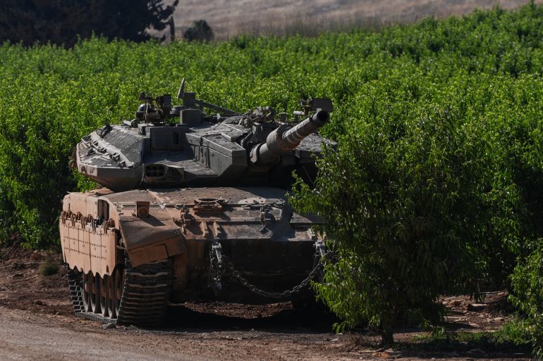 An Israeli tank in a plantation, close to the Israel-Lebanon border, in northern Israel, June 8, 2026. REUTERS/Ayal Margolin ISRAEL OUT. NO COMMERCIAL OR EDITORIAL SALES IN ISRAEL
