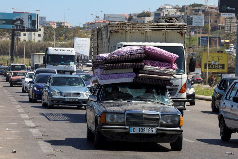 Displaced people make their way back to their homes in southern Lebanon following a deal between the U.S. and Iran, in Sidon, Lebanon, June 15, 2026. REUTERS/Aziz Taher TPX IMAGES OF THE DAY