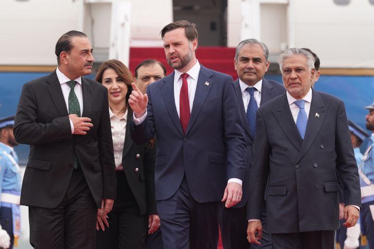 ISLAMABAD, PAKISTAN - APRIL 11: U.S. Vice President JD Vance (C) walks with Pakistan's Chief of Defence Forces and Chief of Army Staff Field Marshall Asim Munir (L), and Pakistani Deputy Prime Minister and Foreign Minister Mohammad Ishaq Dar after arriving for talks with Iranian officials on April 11, 2026 at Islamabad, Pakistan. The proposed meeting marks a rare direct engagement between senior U.S. and Iranian officials, as Washington and Tehran seek to advance stalled negotiations over Iran's nuclear programme, with Pakistan serving as neutral ground amid persistent tensions between the two countries. (Photo by Jacquelyn Martin - Pool/Getty Images)