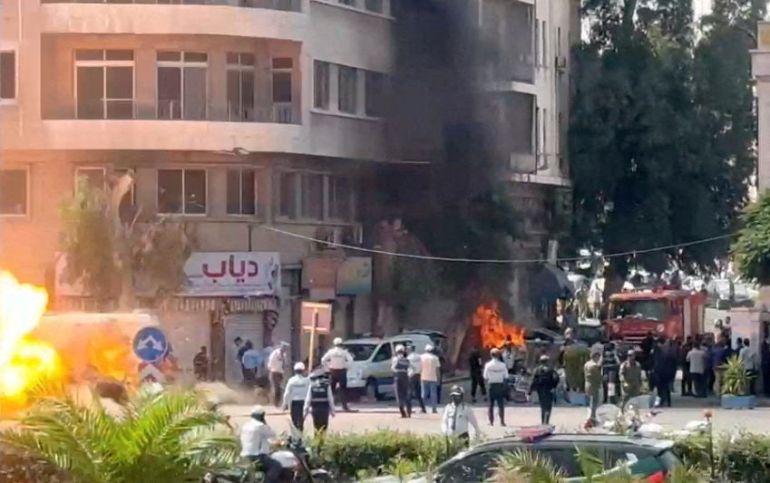 ****داخلية**** Emergency personnel work as smoke and fire rise at the site where explosive devices blew up near a hotel where French President Emmanuel Macron was meant to be staying, in Damascus, Syria, in this screengrab obtained from a video, July 7, 2026. REUTERS/Yamam Al Shaar