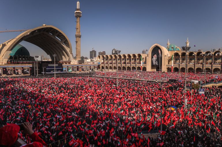 TOPSHOT - This handout photograph provided by the Iranian supreme leader office (Khamenei.IR) shows mourners gathering to pray for Iran's slain supreme leader Ayatollah Ali Khamenei during the second day of funeral ceremonies at the Grand Mosalla in Tehran on July 5, 2026.