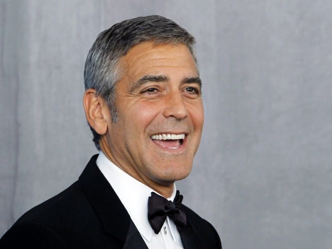 Actor George Clooney poses backstage after receiving the Bob Hope Humanitarian Award at the 62nd annual Primetime Emmy Awards in Los Angeles, California, August 29, 2010.