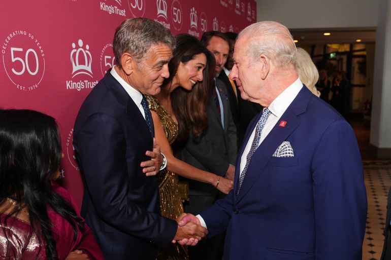 LONDON, ENGLAND - MAY 11: King Charles III meets George Clooney as they attend 'A King's Trust 50th Anniversary Celebration' at Royal Albert Hall on May 11, 2026 in London, England. (Photo by Aaron Chown - WPA Pool/Getty Images)