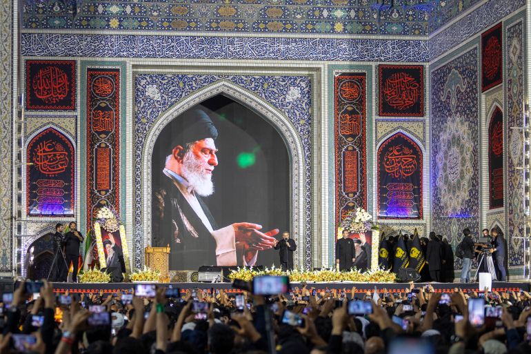 MASHHAD, IRAN - JULY 09: Thousands of mourners gather for the burial of Iran's late supreme leader, Ayatollah Ali Khamenei at the Imam Reza Shrine on July 09, 2026 in Mashhad, Iran. Khamenei and members of his family were killed on February 28 during U.S.-Israeli strikes at the beginning of the war, bringing an end to his 36-year rule over Iran. His body was laid to rest today in his hometown of Mashhad, Iran, following a six-day state funeral that began on July 4 and took place across multiple cities in Iran and Iraq. (Photo by Majid Saeedi/Getty Images)