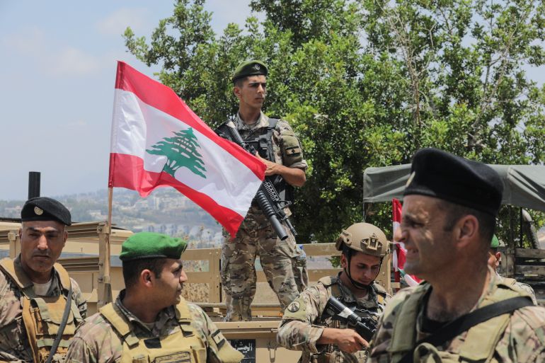 Lebanese soldiers patrol at the entrance to Zawtar al-Gharbiya on July 22, 2026, after the army deployed to the southern village.