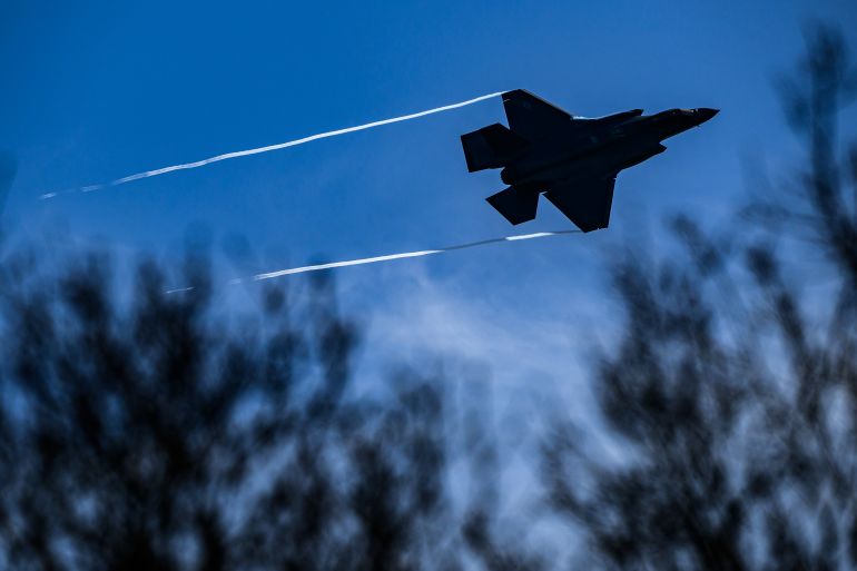 LAKENHEATH, ENGLAND - APRIL 08: A US-AF F-35 Lightning II stealth multirole fighter jet overflies RAF Lakenheath on April 08, 2026 in Lakenheath, England. Keir Starmer has pledged to deny the US permission to use British sovereign bases, including RAF Lakenheath for offensive operations against Iranian infrastructure. While limited access for defensive missions was previously approved, the UK has drawn a firm line against strikes targeting civilian facilities. Over the weekend President Donald Trump issued a "final warning" to Iran, threatening a massive four-hour "obliteration" of its civilian infrastructure if the Strait of Hormuz is not reopened by his deadline of 20:00 eastern time today. (Photo by Leon Neal/Getty Images)