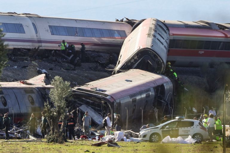 epa13336273 A general view showing the derailed carriages of the two high-speed trains (AVE in Spanish symbols), one of Renfe and another of Iryo, that have crashed in the village of Urda, Toledo, Spain, 28 October 2026. At least ten people have been killed, Spanish media reported. EPA/ISMAEL HERRERO