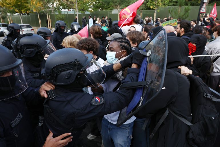 AUBERVILLIERS, FRANCE - OCTOBER 1: French students clash with police near Lycée Le Corbusier Senior high school, during a march through the streets of Aubervilliers, on October 1, 2026 in Aubervilliers, a northern suburb of Paris, France. In a wave of demonstrations that began around Paris last week and spread across France, secondary students have blockaded schools in protest against overcrowded classrooms, teacher shortages, and long class schedules. According to French Interior Minister Laurent Nunez, more than 400 have been detained, many of them minors, as some protests turned violent where students and police clashed. (Photo by Tom Nicholson/Getty Images)